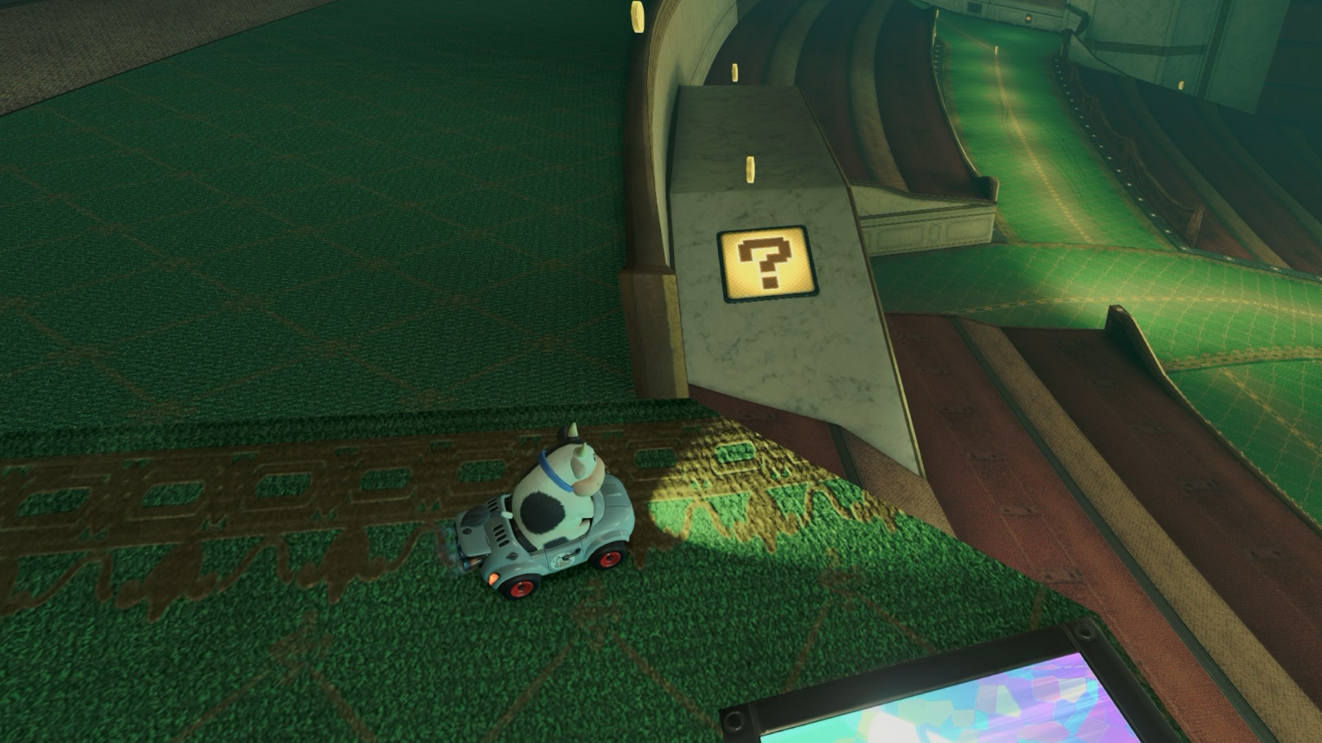 A cow overlooking a "?" panel in Mario Kart World.