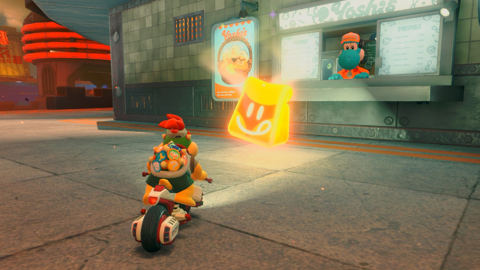 Bowser Jr staring at a Dash Food, a glowing paper bag with a smiley face on it, in Mario Kart World.